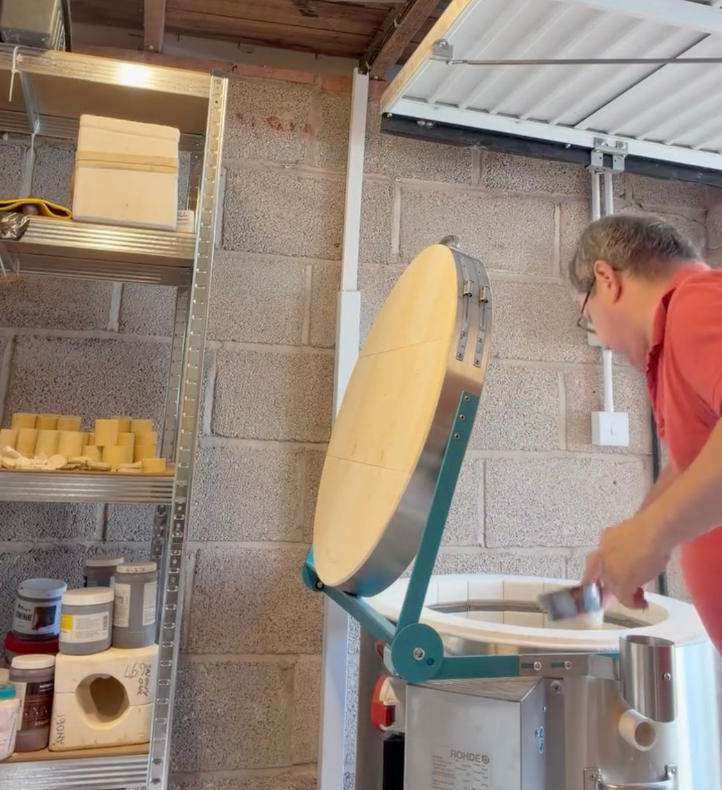 Geoff Paris opening his kiln